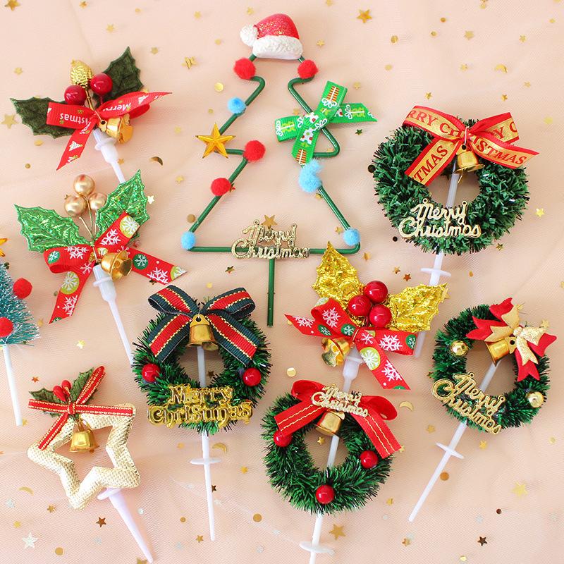 Đồ trang trí bánh Giáng Sinh: vòng lá thông, ông già Noel, cây thông, trang trí ngọt cho bàn tiệc.