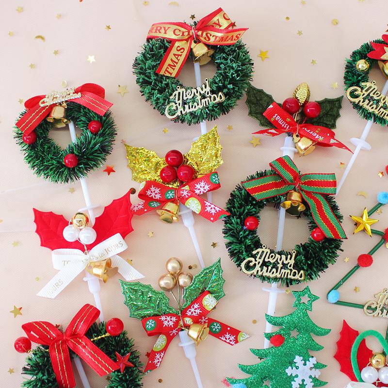 Đồ trang trí bánh Giáng Sinh: vòng lá thông, ông già Noel, cây thông, trang trí ngọt cho bàn tiệc.