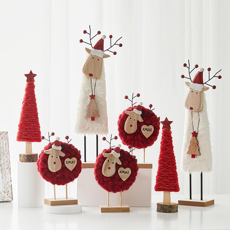 Đồ trang trí Giáng Sinh phong cách Bắc Âu - gỗ và len, bao gồm tuần lộc, ông già Noel, cây thông. Hoàn hảo cho trang trí bàn và không gian Giáng Sinh.