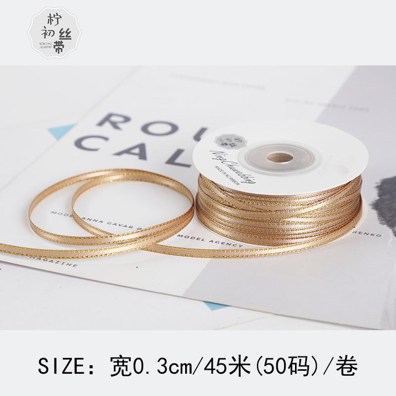 Dải ruy băng vàng kim 3mm, lý tưởng cho gói quà, trang trí bánh, và DIY. Chất liệu satin cao cấp, dễ sử dụng cho mọi nhu cầu.