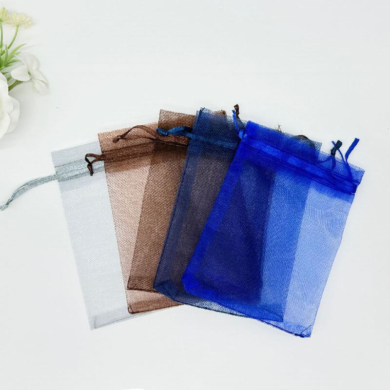 Túi lưới euge màu đơn giản, sẵn có, lý tưởng cho đóng gói mỹ phẩm, quà tặng và trang sức. Chất liệu nhẹ và tiện dụng cho mọi nhu cầu.