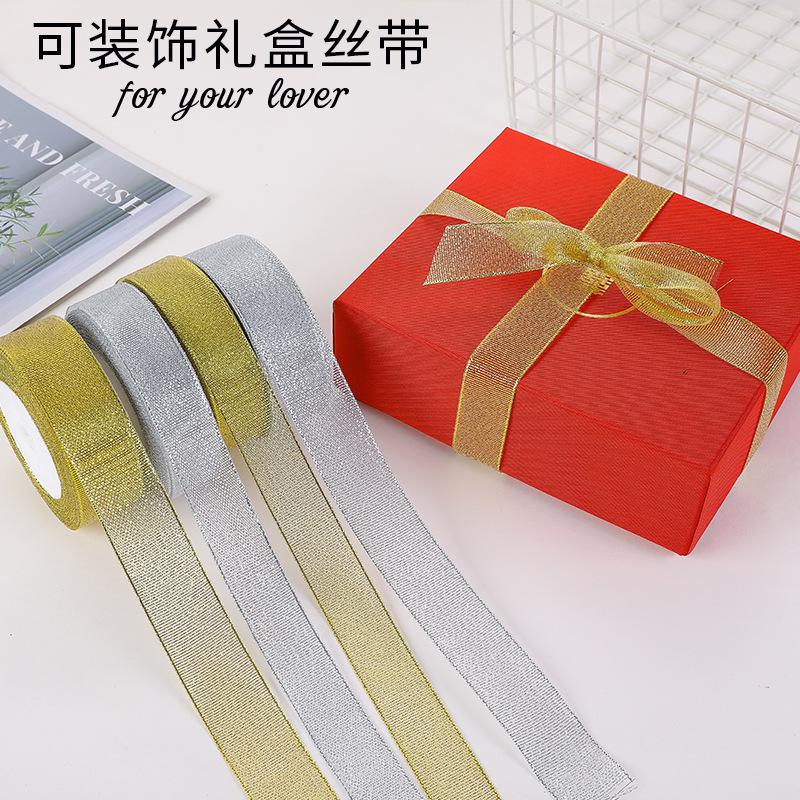 Dây kim tuyến vàng và bạc, kích thước 0.6-5cm, lý tưởng cho hộp quà trái cây và đóng gói bánh. Bán buôn và trang trí lễ hội.