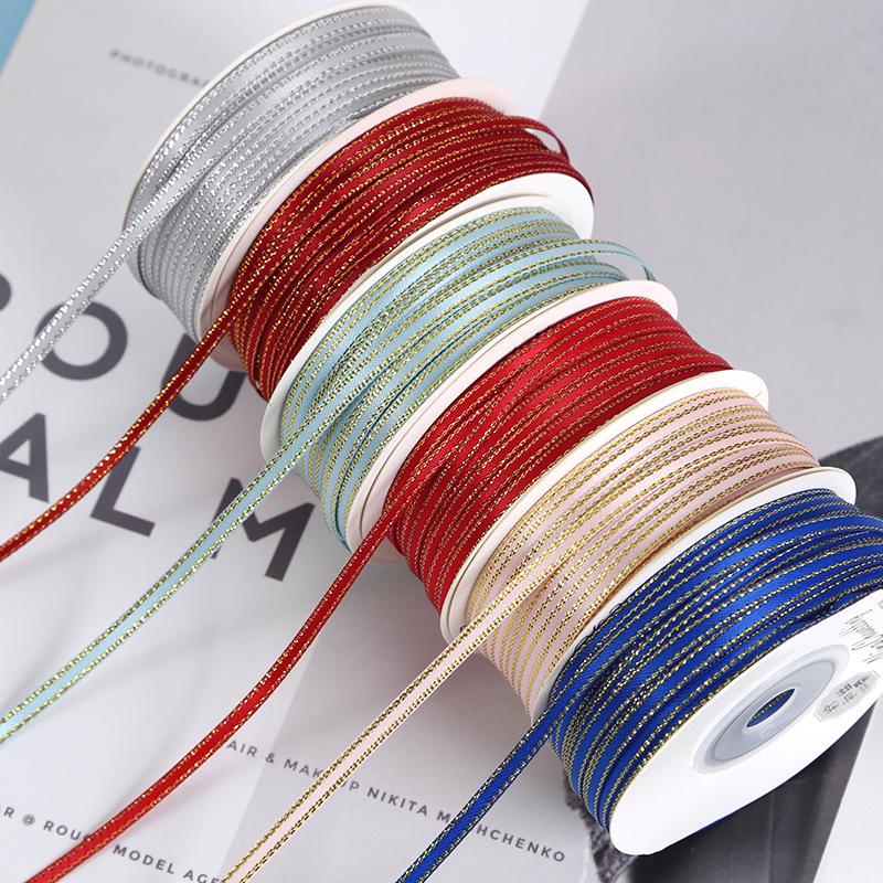 Dải ruy băng vàng kim 3mm, lý tưởng cho gói quà, trang trí bánh, và DIY. Chất liệu satin cao cấp, dễ sử dụng cho mọi nhu cầu.