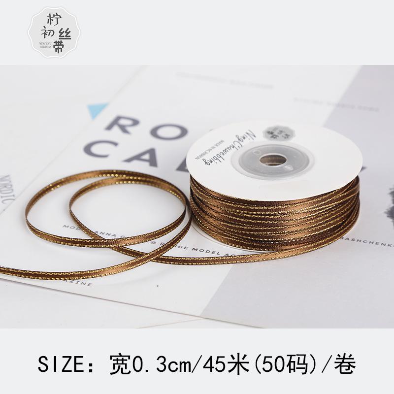 Dải ruy băng vàng kim 3mm, lý tưởng cho gói quà, trang trí bánh, và DIY. Chất liệu satin cao cấp, dễ sử dụng cho mọi nhu cầu.