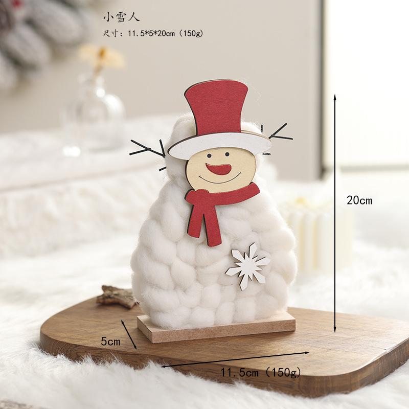 Đồ trang trí Giáng Sinh phong cách Bắc Âu - gỗ và len, bao gồm tuần lộc, ông già Noel, cây thông. Hoàn hảo cho trang trí bàn và không gian Giáng Sinh.