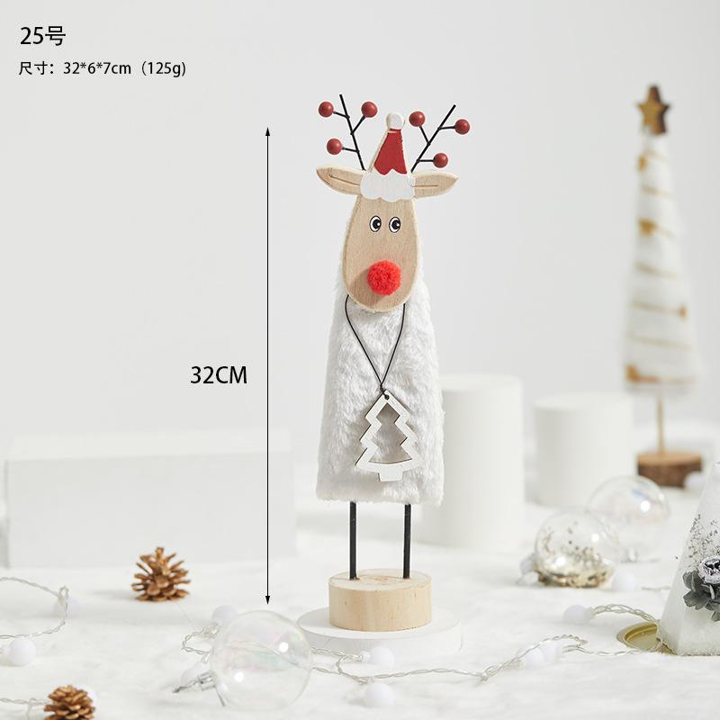Đồ trang trí Giáng Sinh phong cách Bắc Âu - gỗ và len, bao gồm tuần lộc, ông già Noel, cây thông. Hoàn hảo cho trang trí bàn và không gian Giáng Sinh.