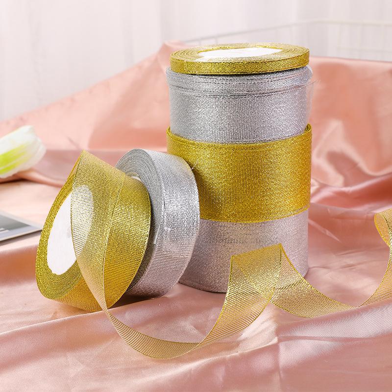 Dây kim tuyến vàng và bạc, kích thước 0.6-5cm, lý tưởng cho hộp quà trái cây và đóng gói bánh. Bán buôn và trang trí lễ hội.
