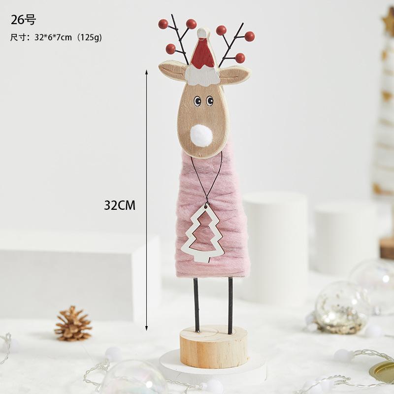 Đồ trang trí Giáng Sinh phong cách Bắc Âu - gỗ và len, bao gồm tuần lộc, ông già Noel, cây thông. Hoàn hảo cho trang trí bàn và không gian Giáng Sinh.