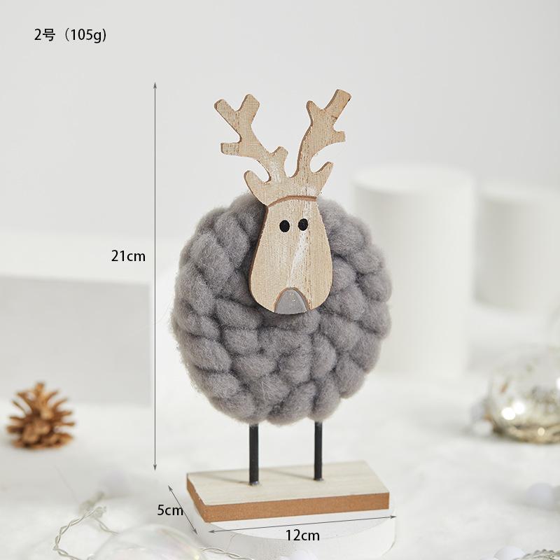Đồ trang trí Giáng Sinh phong cách Bắc Âu - gỗ và len, bao gồm tuần lộc, ông già Noel, cây thông. Hoàn hảo cho trang trí bàn và không gian Giáng Sinh.