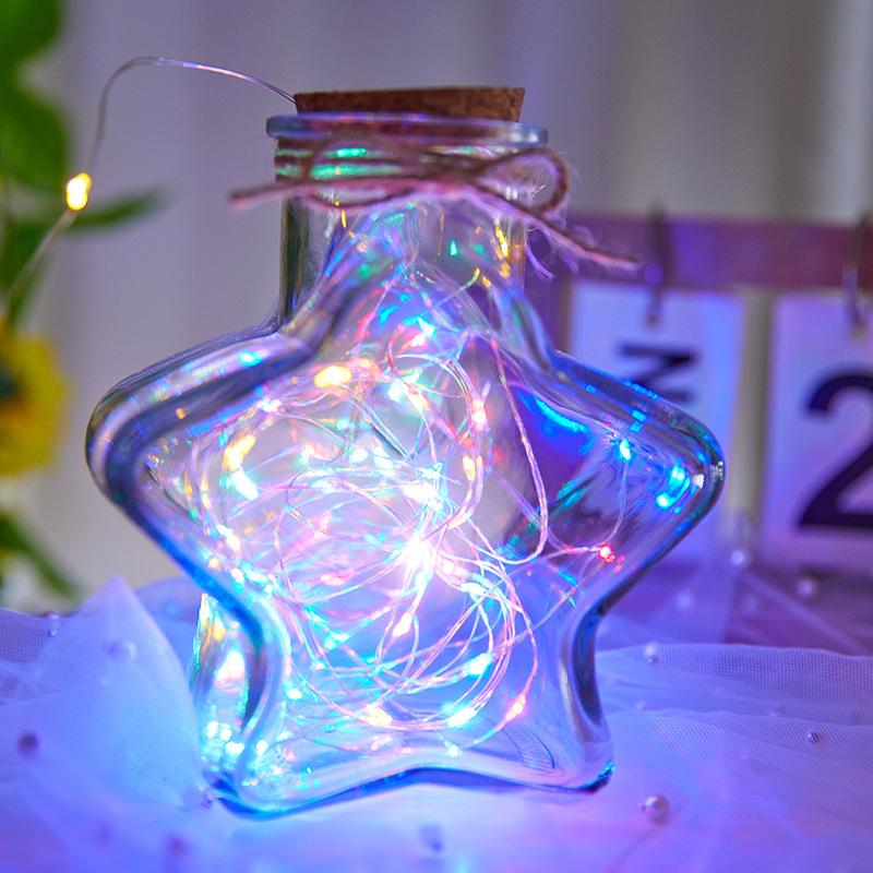 Dây đèn LED dạng sao, nút bấm, sử dụng pin, với dây đồng. Hoàn hảo cho trang trí hoa và sự kiện, tạo hiệu ứng ánh sáng lấp lánh và không khí lãng mạn.
