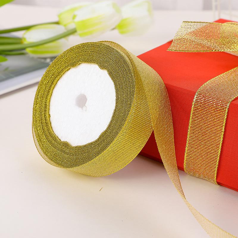 Dây kim tuyến vàng và bạc, kích thước 0.6-5cm, lý tưởng cho hộp quà trái cây và đóng gói bánh. Bán buôn và trang trí lễ hội.