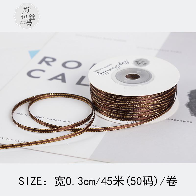 Dải ruy băng vàng kim 3mm, lý tưởng cho gói quà, trang trí bánh, và DIY. Chất liệu satin cao cấp, dễ sử dụng cho mọi nhu cầu.